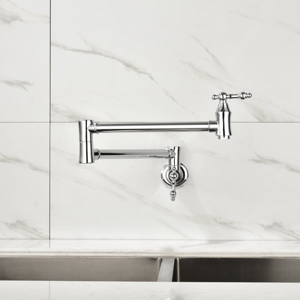 Chrome kitchen faucet mounted on a white tiled wall